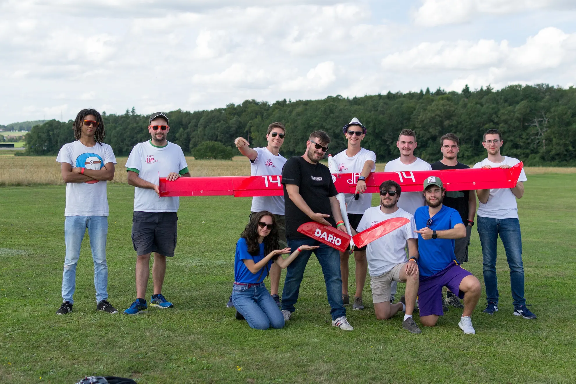 The LiftUP team with its banner, 2019